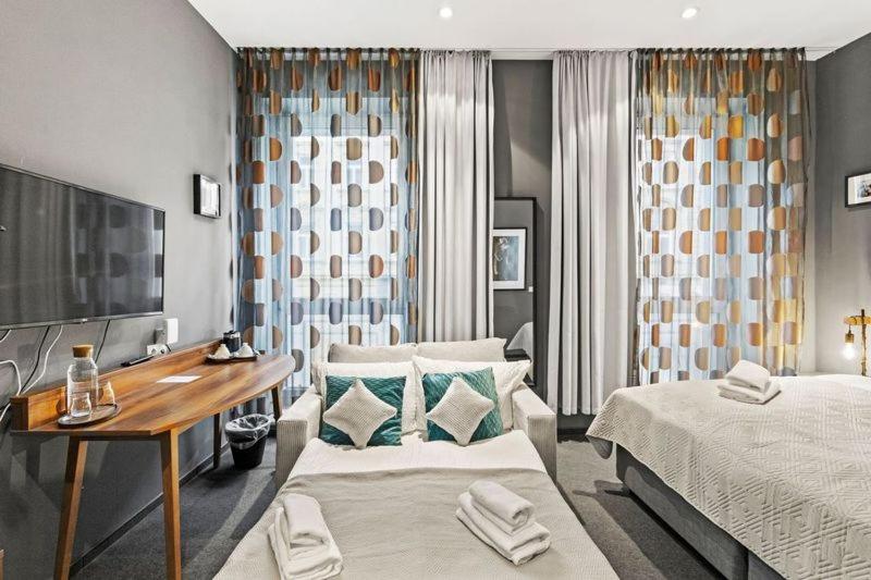 Voodi või voodid majutusasutuse Hotel George Vienna toas