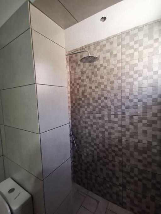 Ванная комната в Ammos 2 - Seafront maisonette, Glyfo beach, Sifnos
