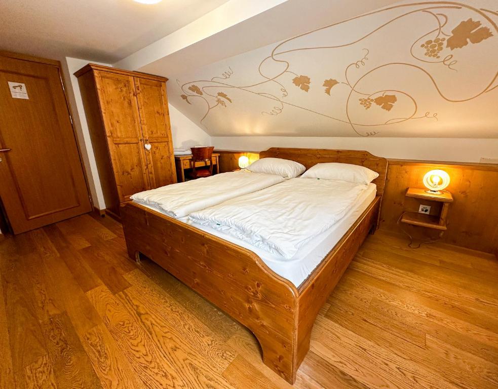 Postel nebo postele na pokoji v ubytování Locanda Orelli