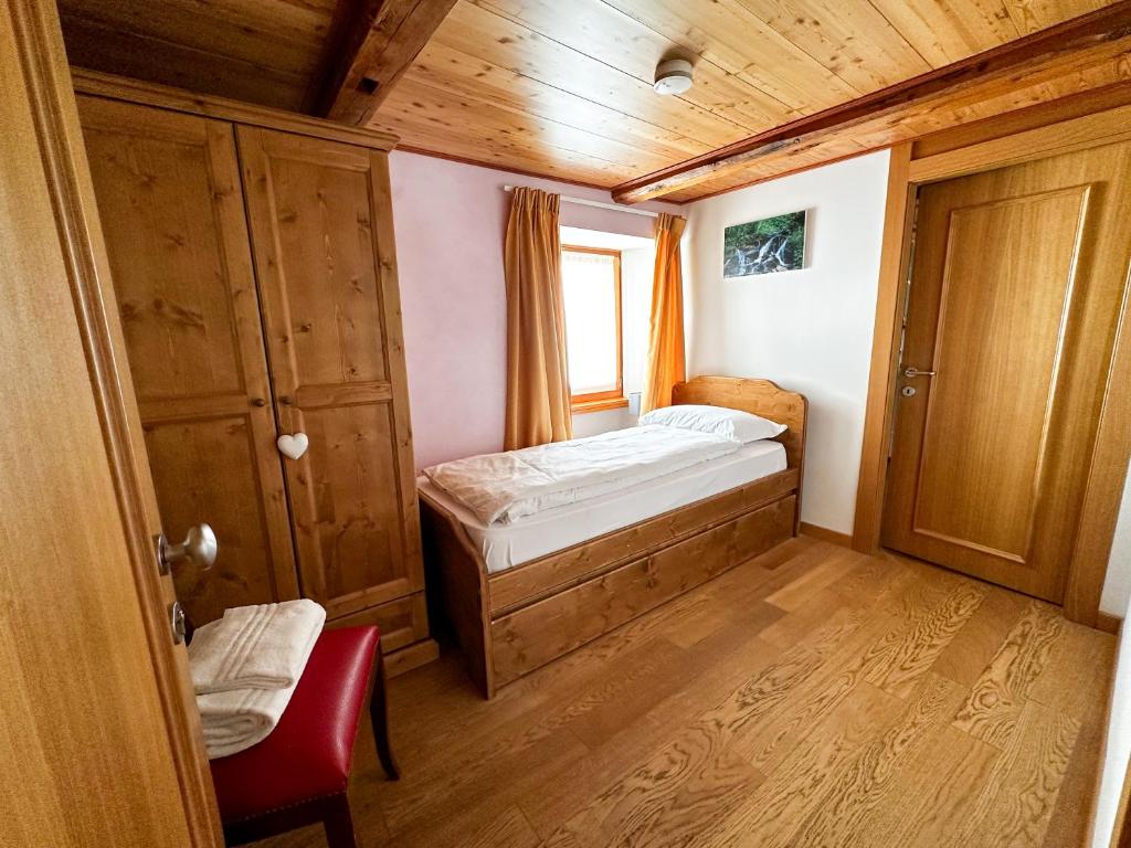 Postel nebo postele na pokoji v ubytování Locanda Orelli