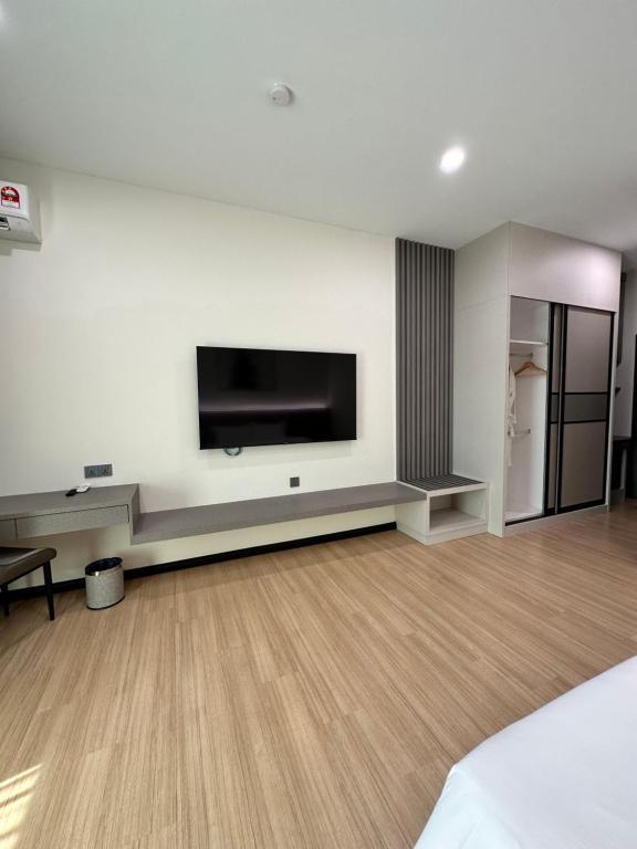 TV a/nebo společenská místnost v ubytování Wendu Inn Hotel