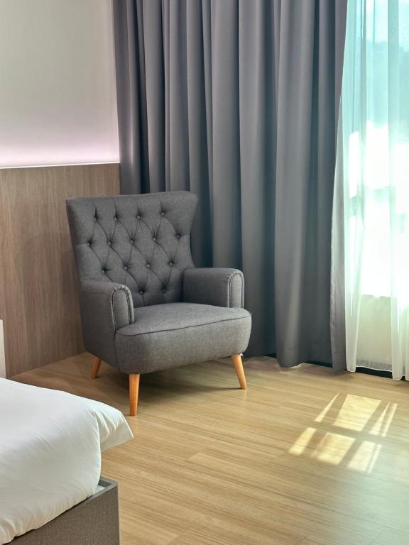 Posezení v ubytování Wendu Inn Hotel