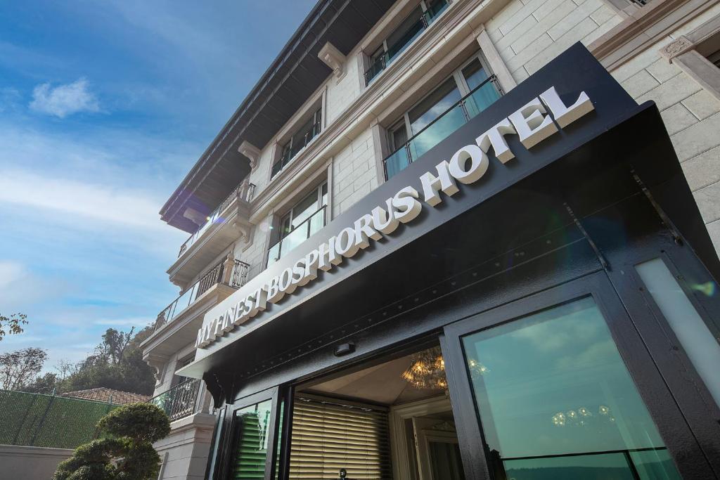a hotel sign on the front of a building at MFB Tarabya Hotel in Istanbul