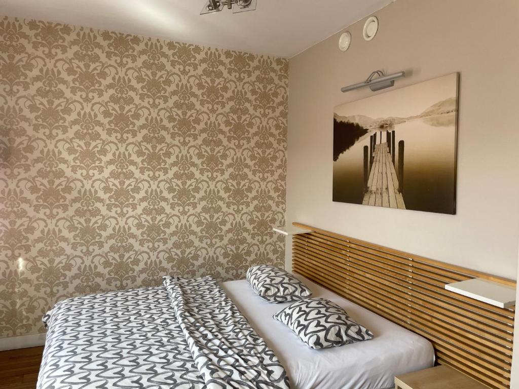 Łóżko lub łóżka w pokoju w obiekcie Apartment 24 Premium Old Town Wroclaw