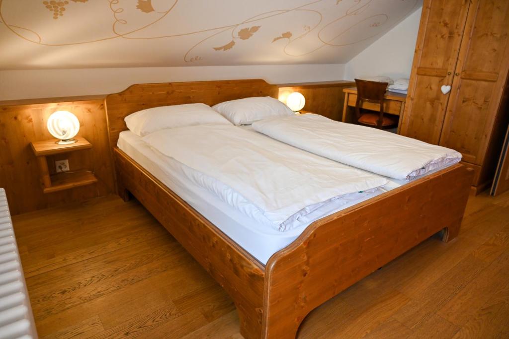 Postel nebo postele na pokoji v ubytování Locanda Orelli
