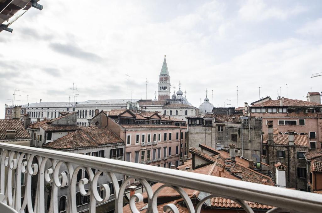 a view of a city from a balcony at Residenza Tiziana Venezia in Venice