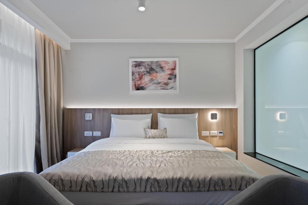 Postel nebo postele na pokoji v ubytování Hotel Podrinje