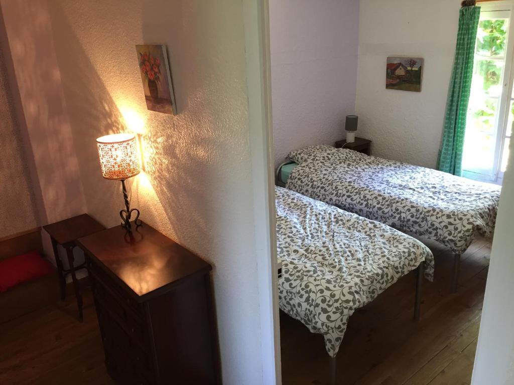 Postel nebo postele na pokoji v ubytování Saint Sever des Pyrenees