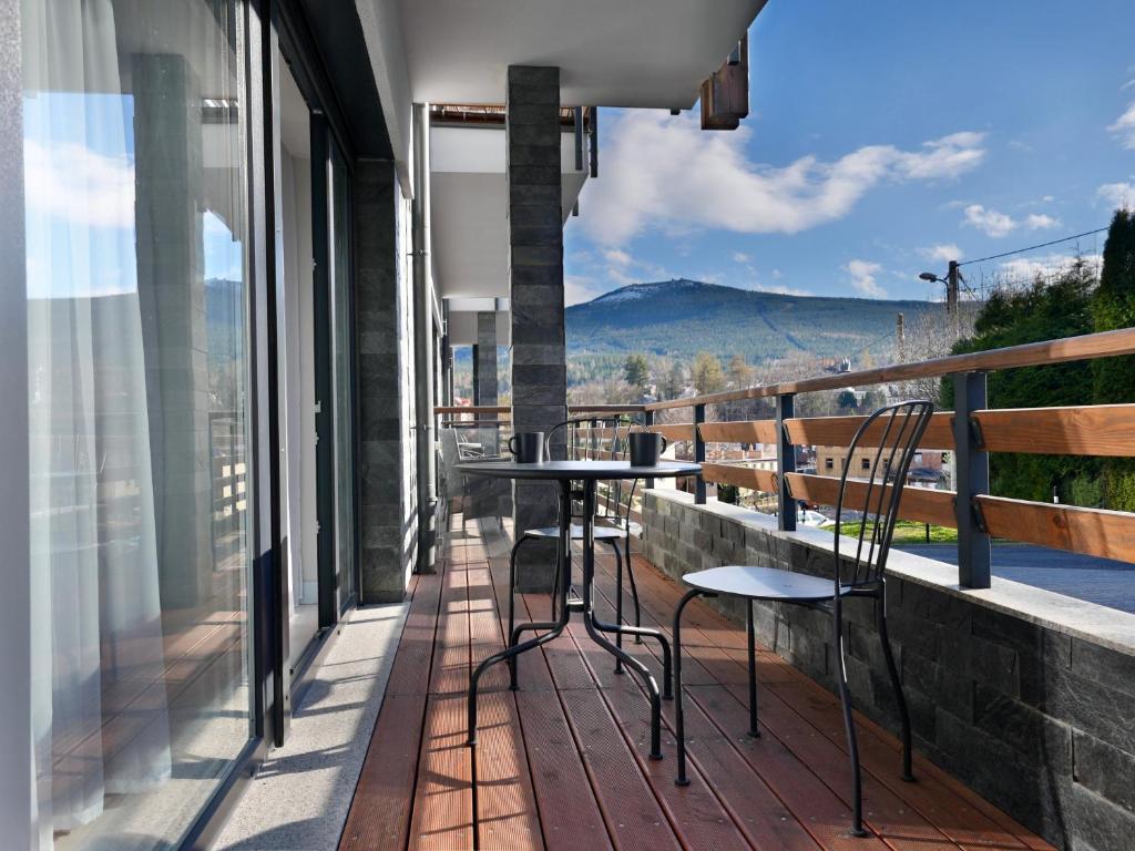 En balkon eller terrasse på RentPlanet - Apartament Franciszkańska