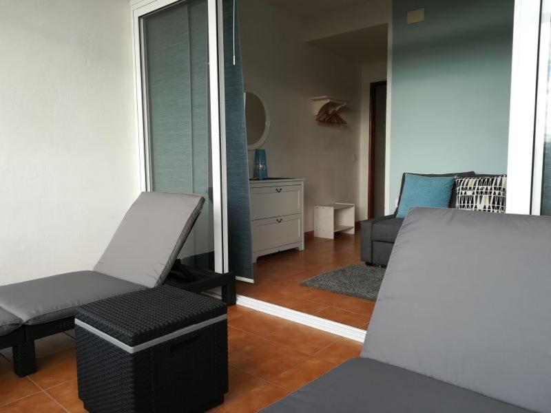 A seating area at Apartments Playa La Aldea