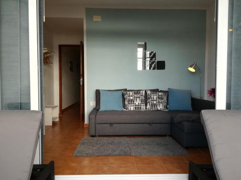 A seating area at Apartments Playa La Aldea