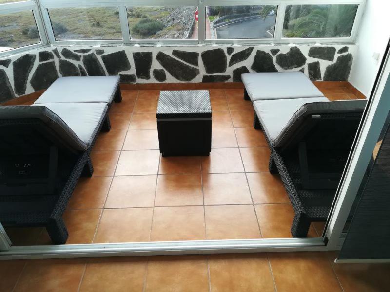 A seating area at Apartments Playa La Aldea