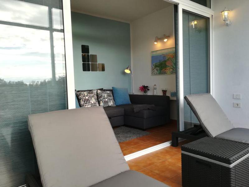 A seating area at Apartments Playa La Aldea