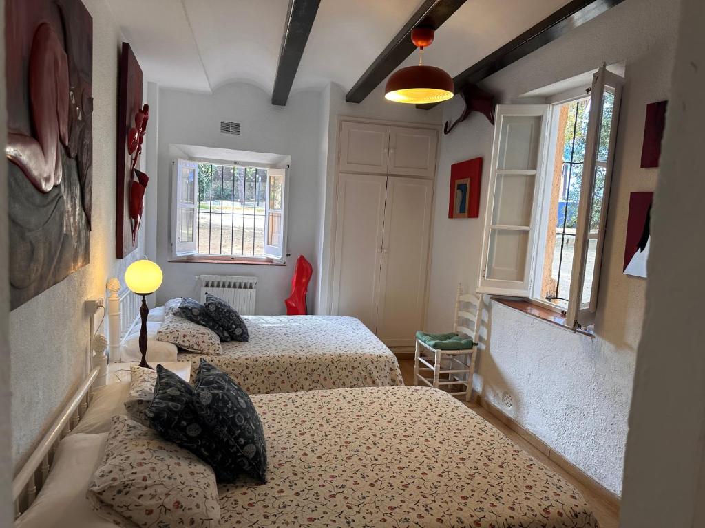 Posteľ alebo postele v izbe v ubytovaní Casa única con jardín a 45 metros de la playa. BE