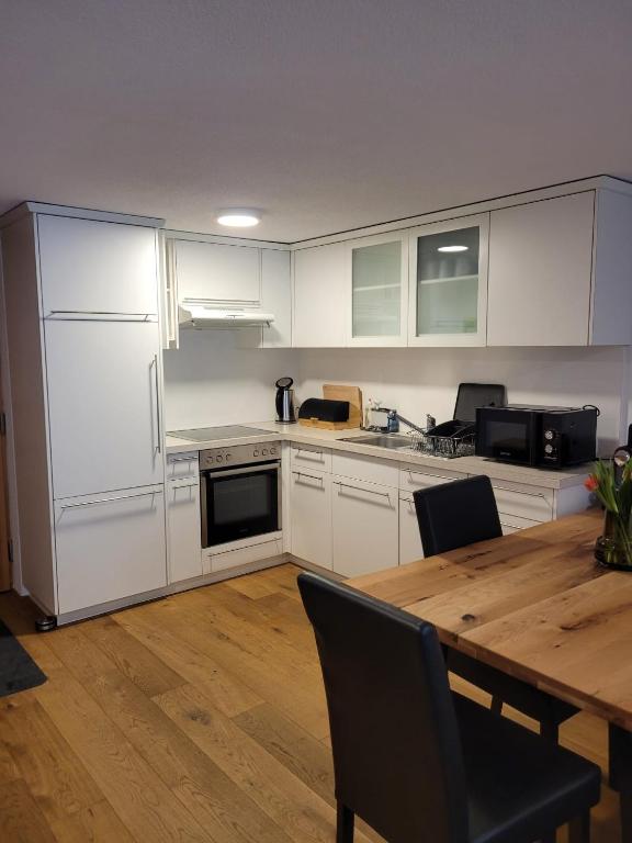 Kuchyň nebo kuchyňský kout v ubytování Waibel Appartement Bezau