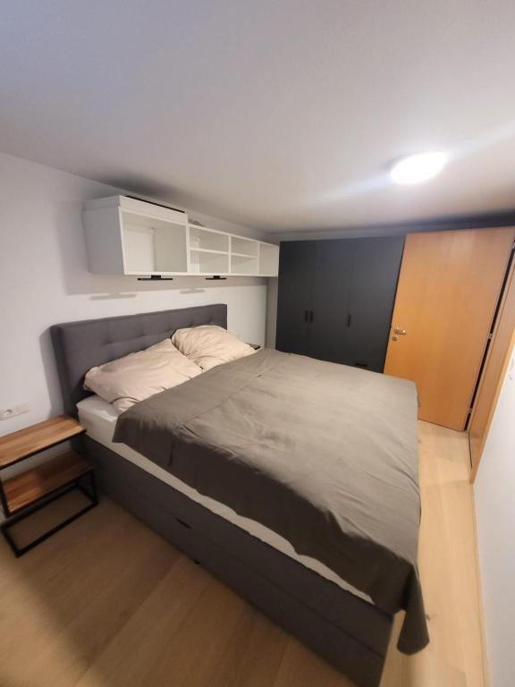 Postel nebo postele na pokoji v ubytování Waibel Appartement Bezau