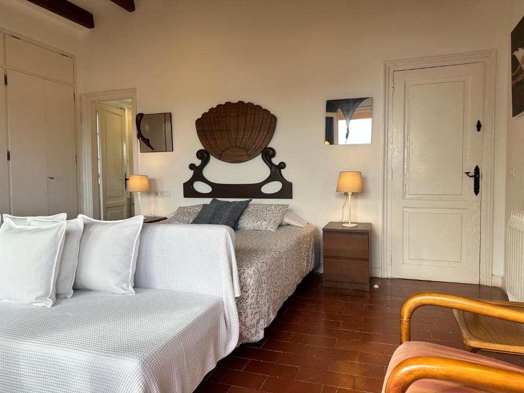 Posteľ alebo postele v izbe v ubytovaní Casa única con jardín a 45 metros de la playa. BE