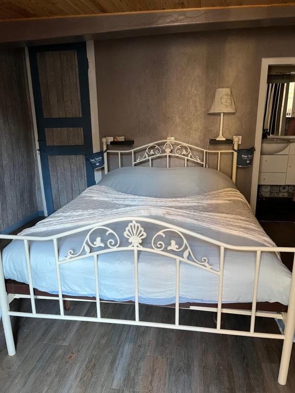 Postel nebo postele na pokoji v ubytování Gîte Pierre et Meuse