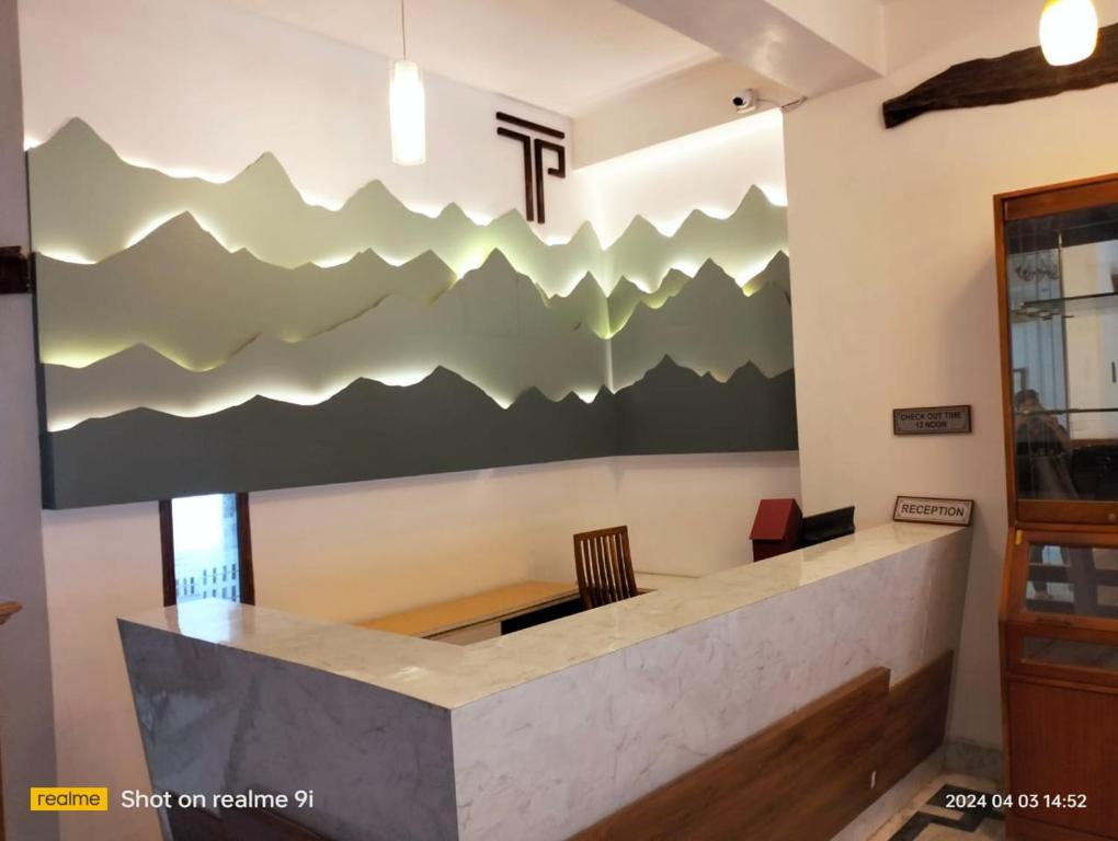 Postel nebo postele na pokoji v ubytování Tashi Palace