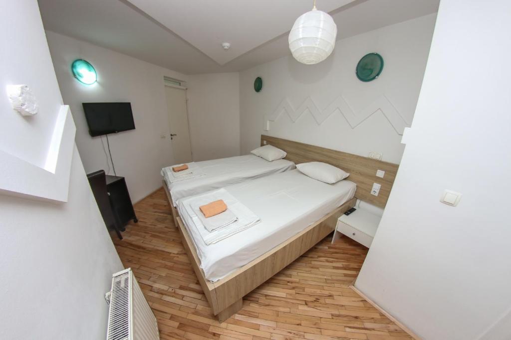 Postel nebo postele na pokoji v ubytování Hotel Hayat
