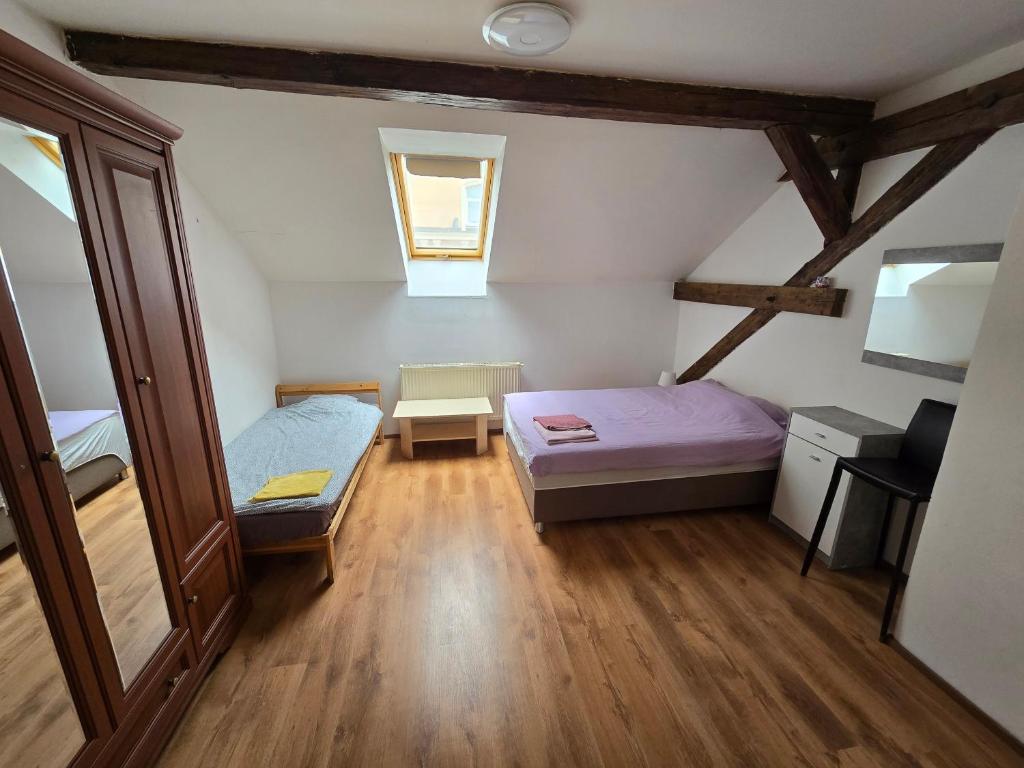 Postel nebo postele na pokoji v ubytování Apartments Žižkov a