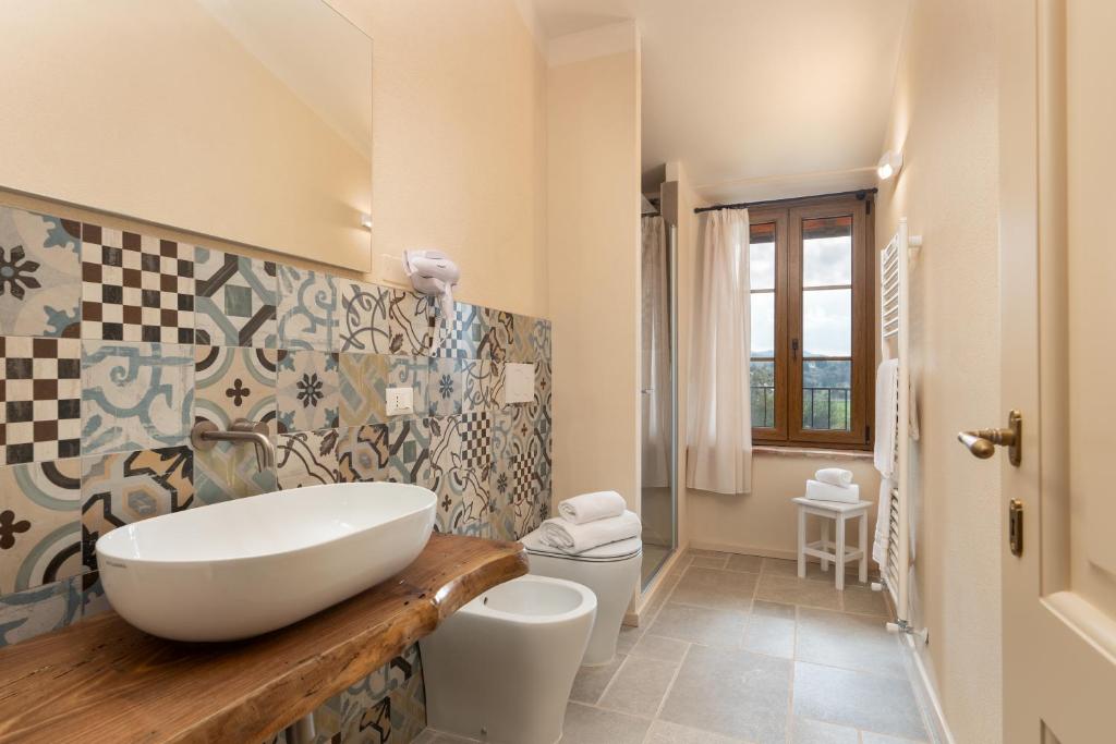 Koupelna v ubytování Agriturismo Tenuta i 4 venti