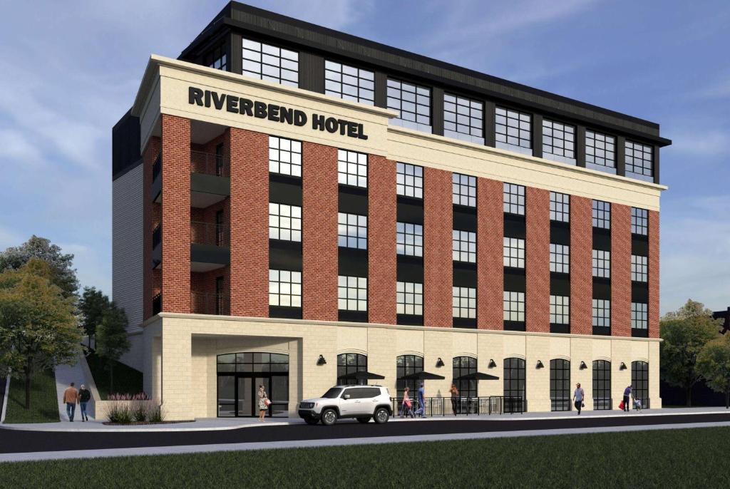 eine Darstellung des neuen renovierten Hotelgebäudes in der Unterkunft Riverbend Hotel and Suites, Trademark Collection by Wyndham in Ashtabula