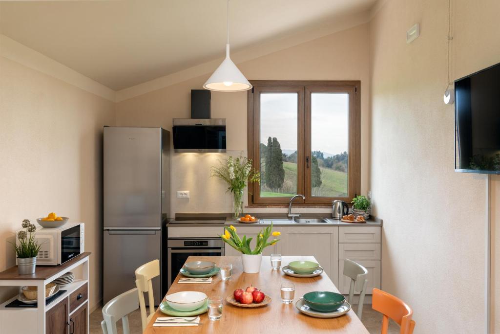Kuchyň nebo kuchyňský kout v ubytování Agriturismo Tenuta i 4 venti