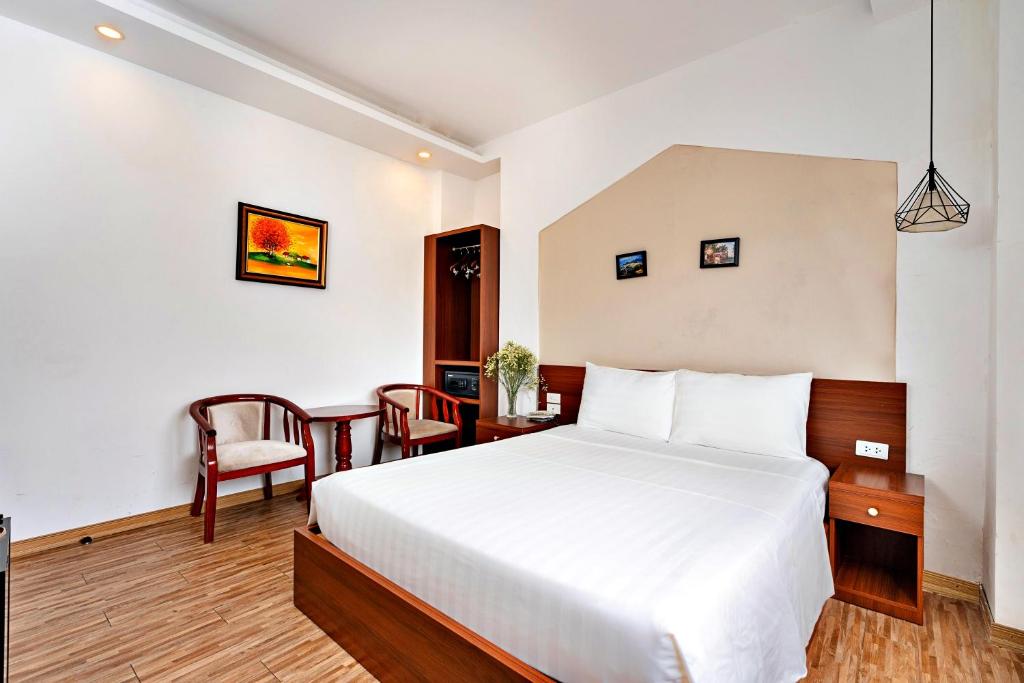 Postel nebo postele na pokoji v ubytování S79 Ami Hotel