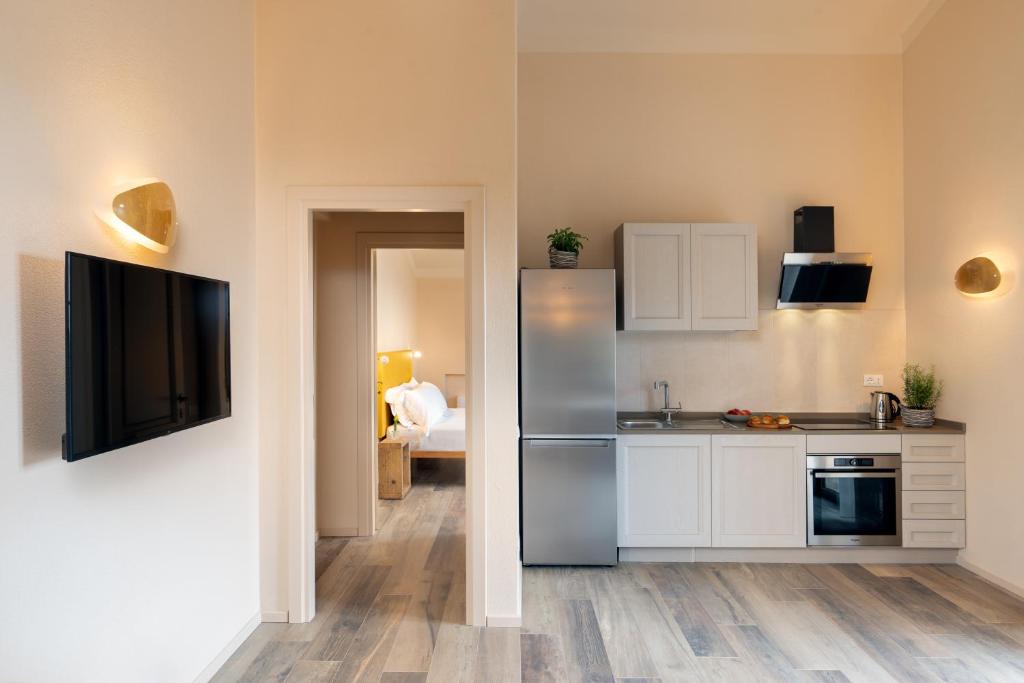 Kuchyň nebo kuchyňský kout v ubytování Agriturismo Tenuta i 4 venti