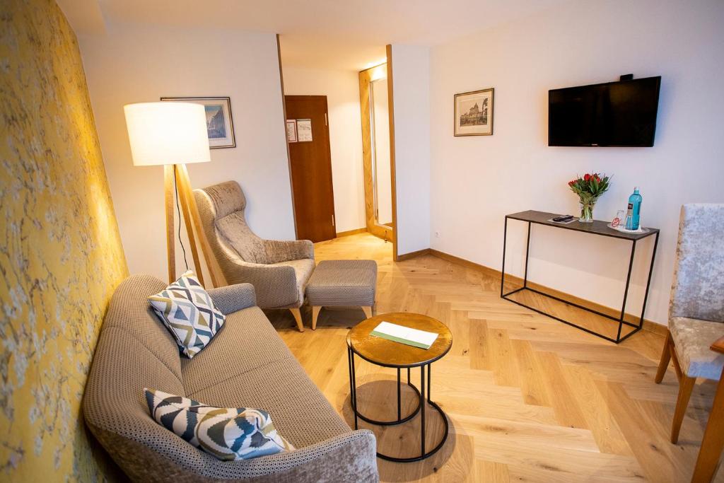 Een TV en/of entertainmentcenter bij Hotel Jagdhaus Wiese
