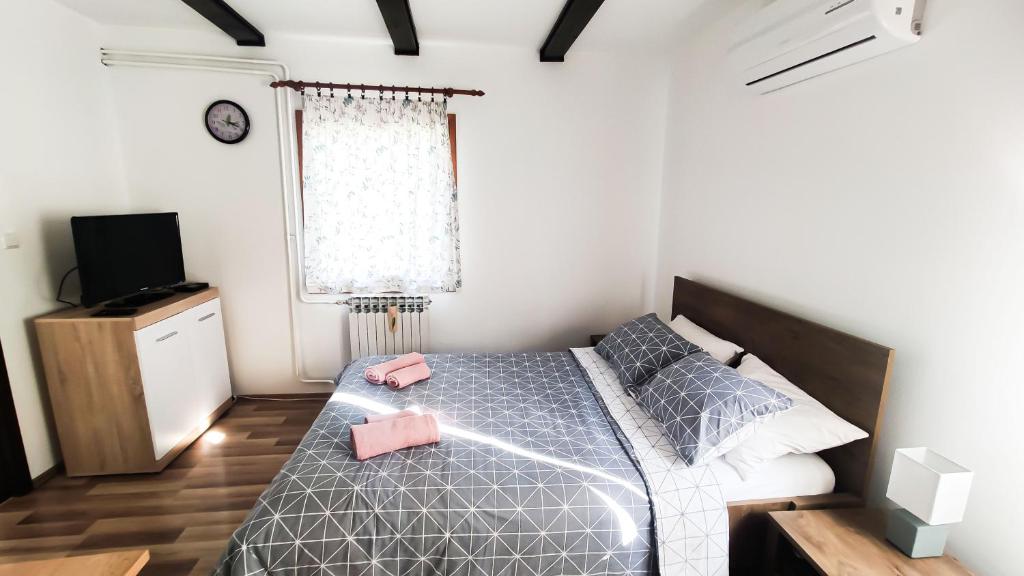Posteľ alebo postele v izbe v ubytovaní Plitvice Glock Apartment