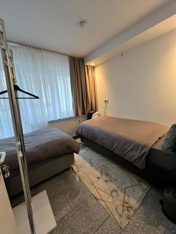 Postel nebo postele na pokoji v ubytování Budget Rooms just for sleeping - Digital access