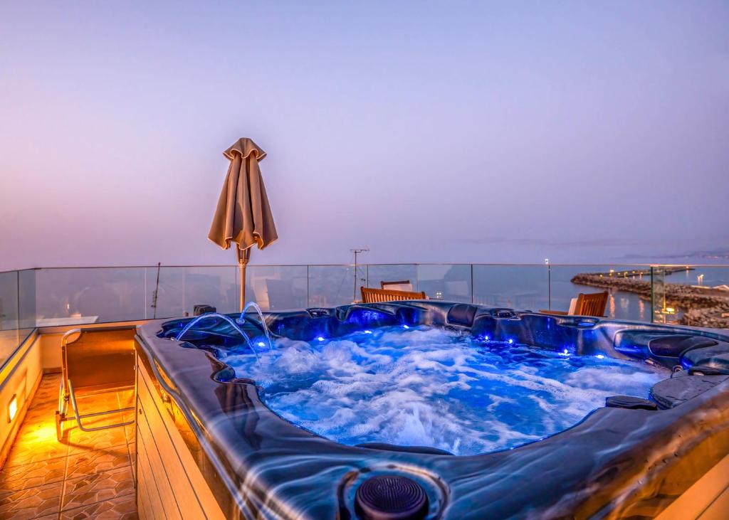 a hot tub on the deck of a cruise ship at Fortezza Side Suite in Rethymno Town