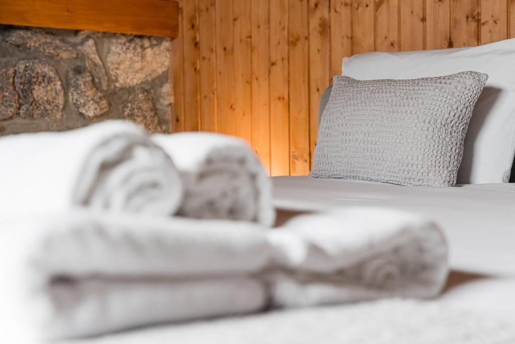 Postel nebo postele na pokoji v ubytování GuestReady - Casas de Fralães 3
