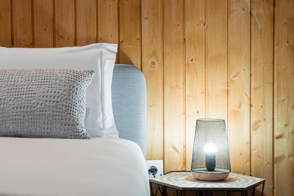 Postel nebo postele na pokoji v ubytování GuestReady - Casas de Fralães 3