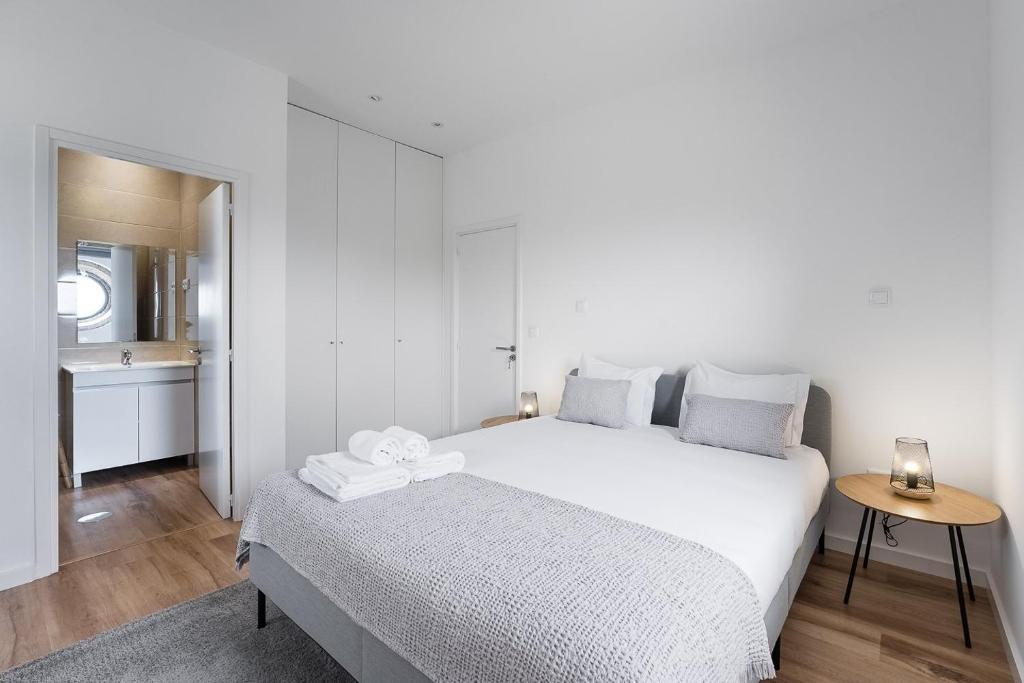 Cama ou camas em um quarto em GuestReady - Casas de Fralães 1