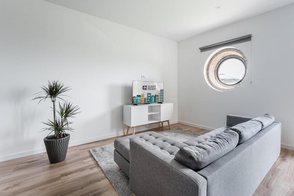 Uma área de estar em GuestReady - Casas de Fralães 1