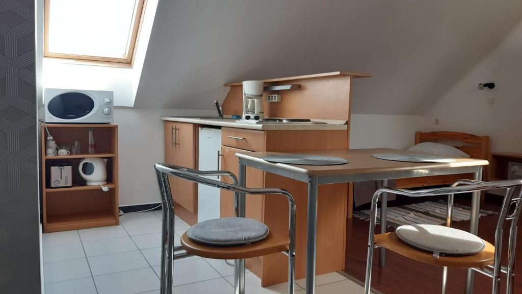 Kuchyňa alebo kuchynka v ubytovaní Mary Apartmanház Hévíz