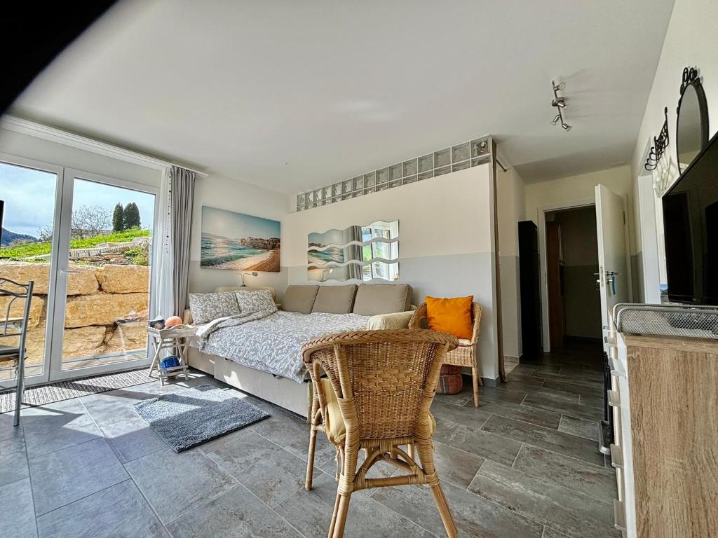 TV a/nebo společenská místnost v ubytování Chez Svanette B&B Villa Sonnglück