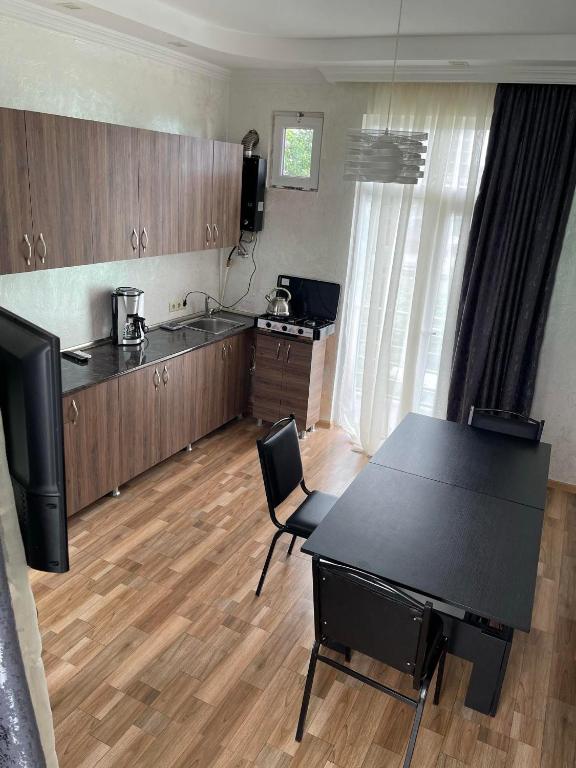 Kuchyň nebo kuchyňský kout v ubytování Hotel Buta