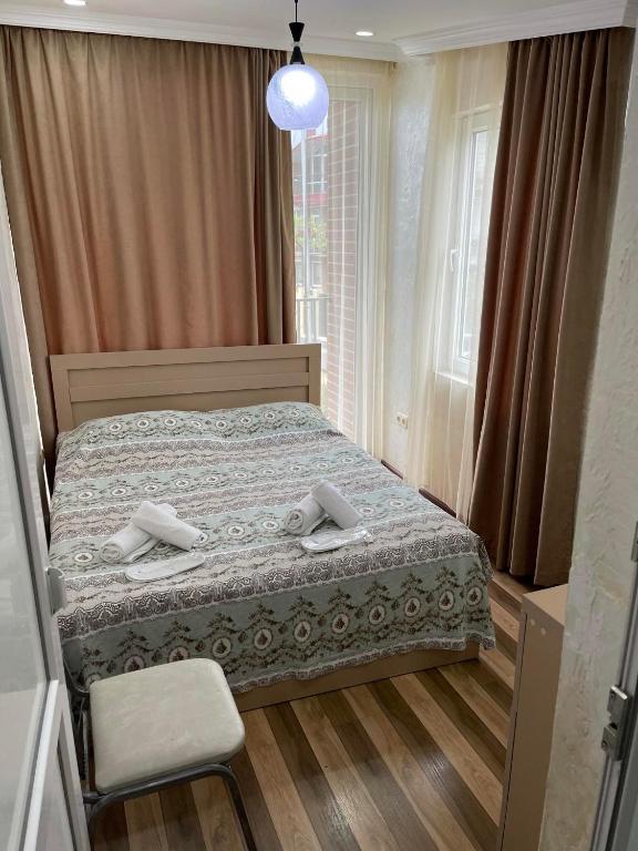 Postel nebo postele na pokoji v ubytování Hotel Buta