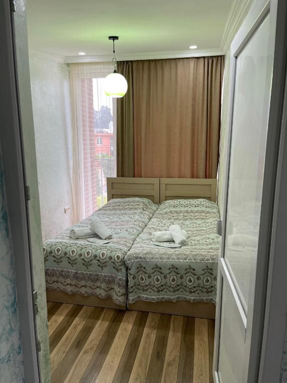 Postel nebo postele na pokoji v ubytování Hotel Buta