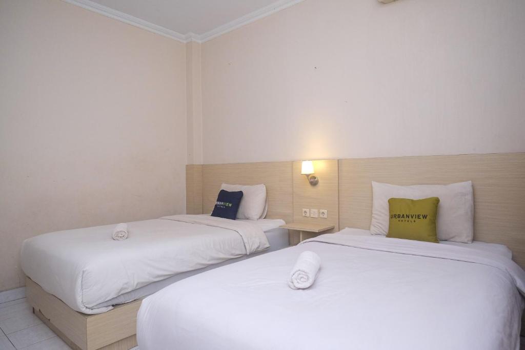 Urbanview Hotel Pondok Anggun Yogyakarta by RedDoorz - Salle Jumelle Supérieure