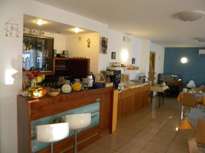Nápoje v ubytování Hotel Eliani