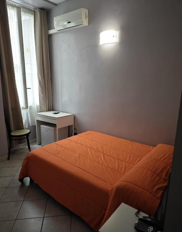 Posteľ alebo postele v izbe v ubytovaní Hotel Esperia