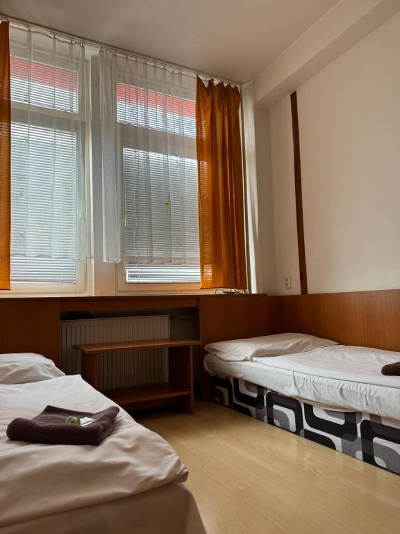 Postel nebo postele na pokoji v ubytování Hotel Avion