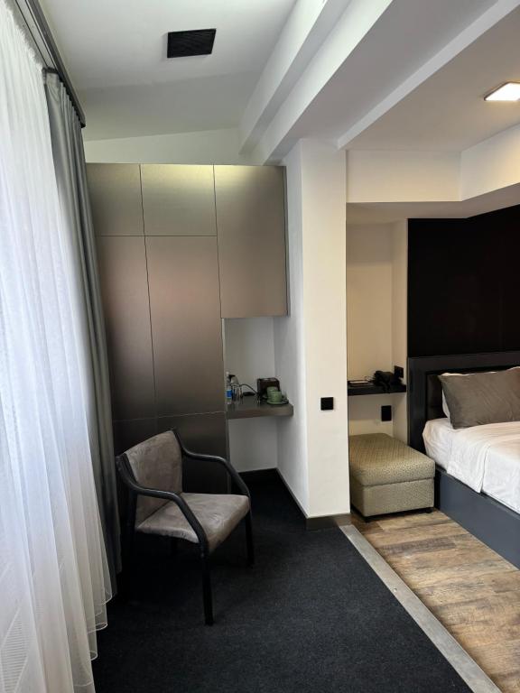 Postel nebo postele na pokoji v ubytování The Phoenix Boutique Hotel