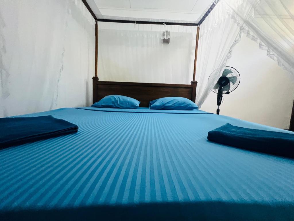 Postel nebo postele na pokoji v ubytování Moon Bay