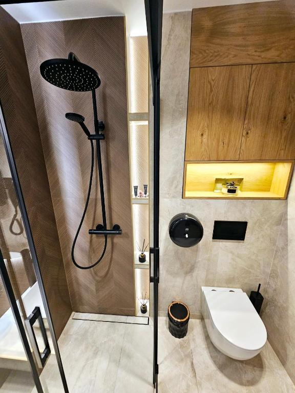 Kúpeľňa v ubytovaní Willa Regina I Resort & SPA
